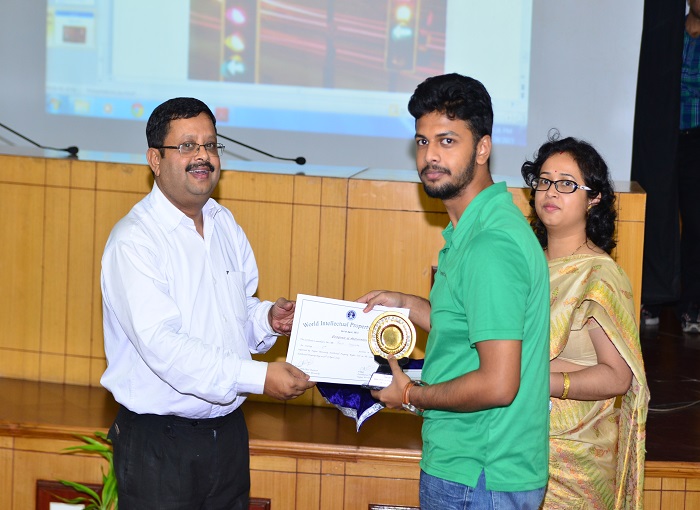 Prof. S.S. Sarkar giving away the second prize of World IP day quiz competition